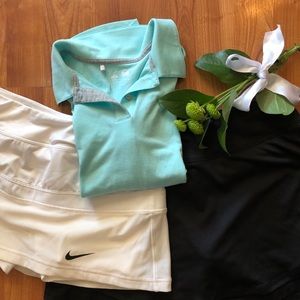 Nike, adidas, champ bundle of 2skorts and 1 shirt.